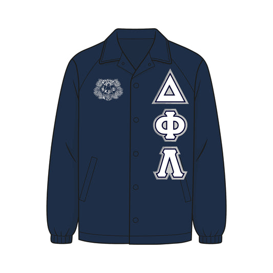 Custom Delta Phi Lambda line jacket. Jacket is a navy coach jacket. The DPhiL crest is on the right chest. Silver, white, and navy DPhiL fabric applique letters are on the left chest. 