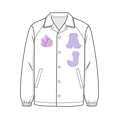 White custom Greek line jacket. The jacket has applique letters "AJ" on the left chest and a custom amethyst design on the right chest.